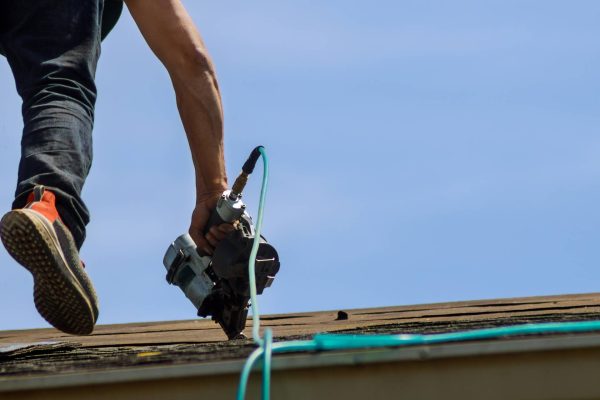 roofers-working-on-replacing-the-house-installed-new-roof